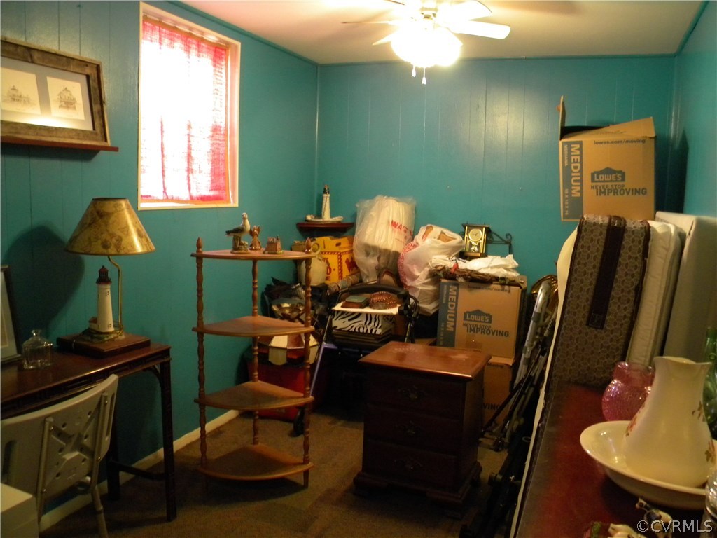 4602 Mizar Road Henrico, VA 23231 - Photo 11 of 13 a room with furniture and a chair