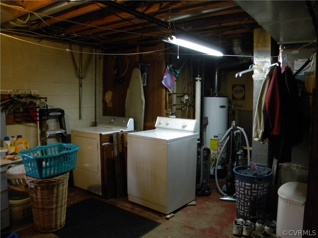 4602 Mizar Road Henrico, VA 23231 - Photo 12 of 13 a view of walk in closet with clothes and shoes