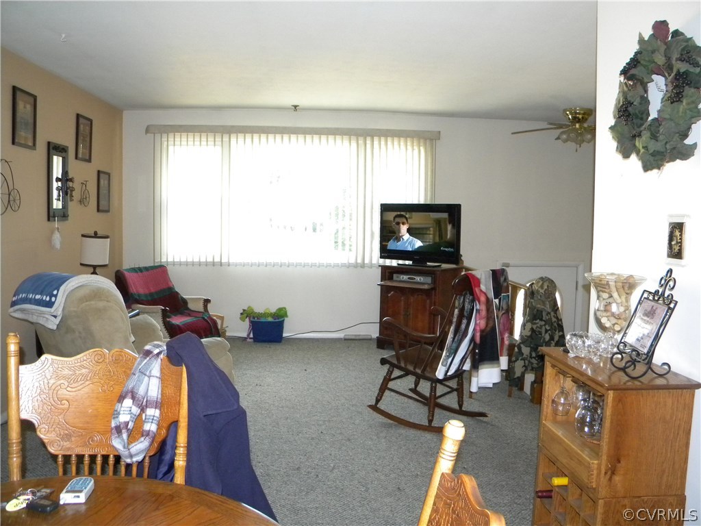 4602 Mizar Road Henrico, VA 23231 - Photo 5 of 13 a view of a livingroom with workspace and a window