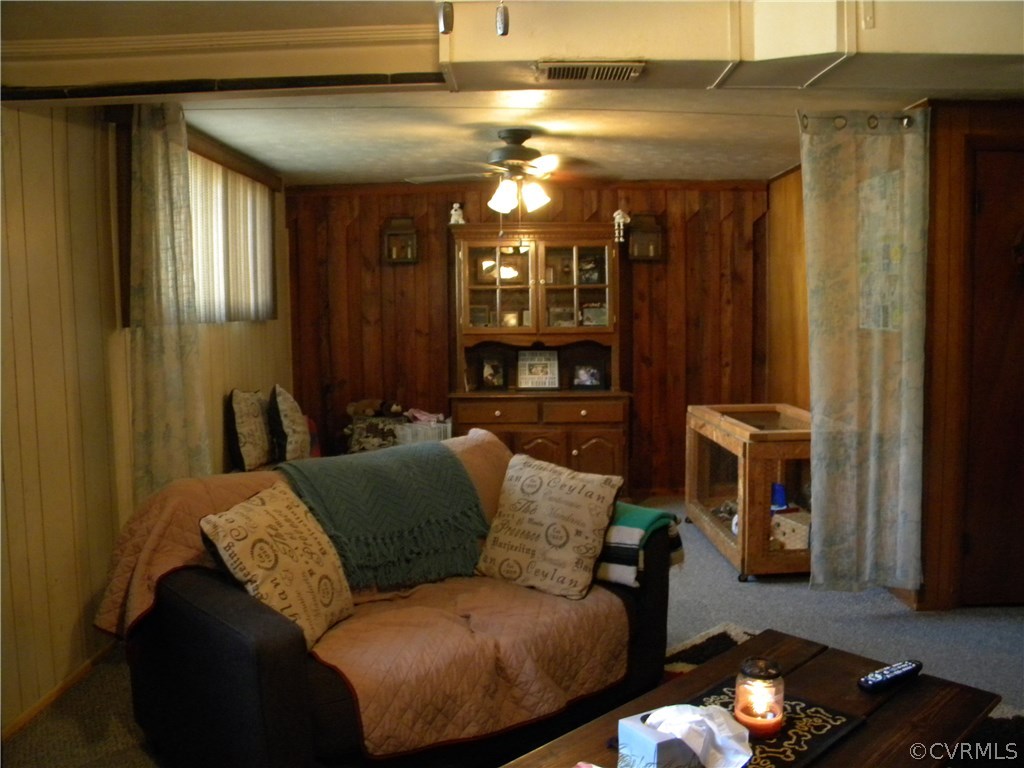 4602 Mizar Road Henrico, VA 23231 - Photo 8 of 13 a living room with furniture and a fireplace