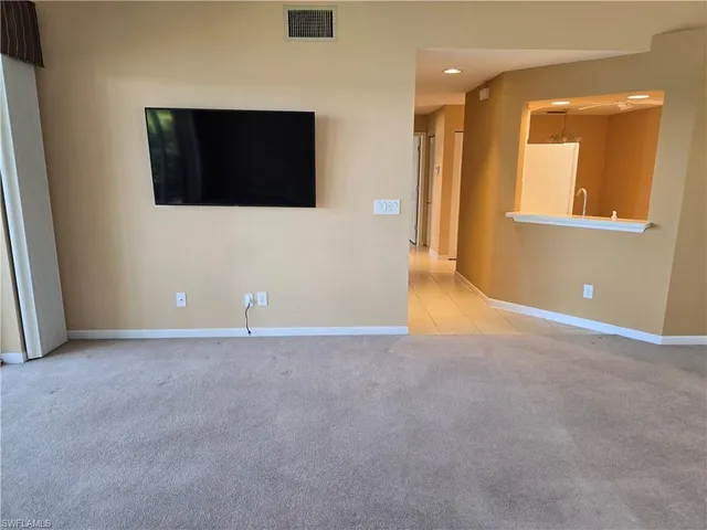 a bathroom with a double vanity sink and mirror