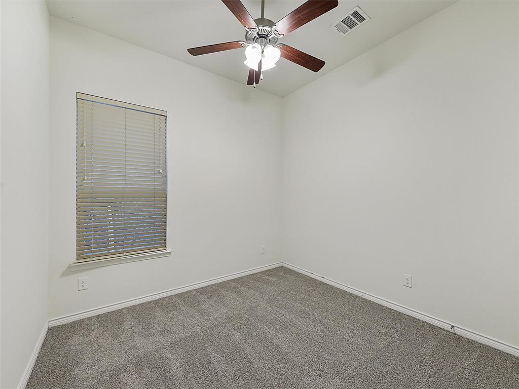 421 Maverick Street Anna, TX 75409 - Photo 20 of 25 Unfurnished room featuring carpet flooring and a ceiling fan