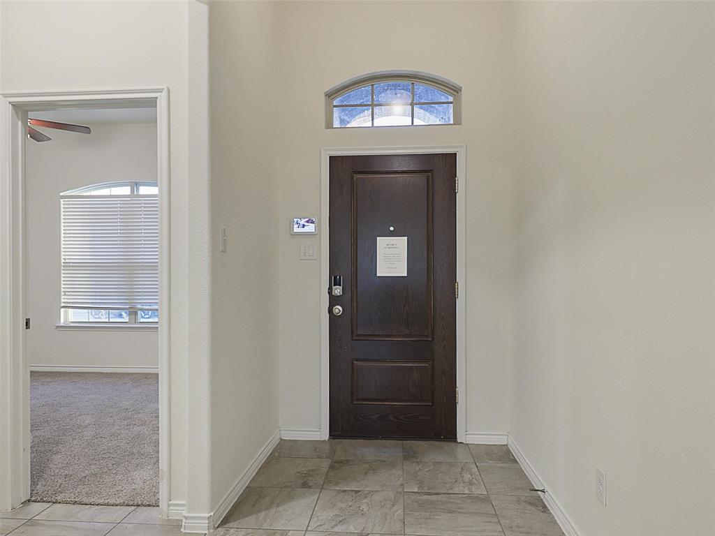 421 Maverick Street Anna, TX 75409 - Photo 4 of 25 Foyer featuring a high ceiling and ceiling fan