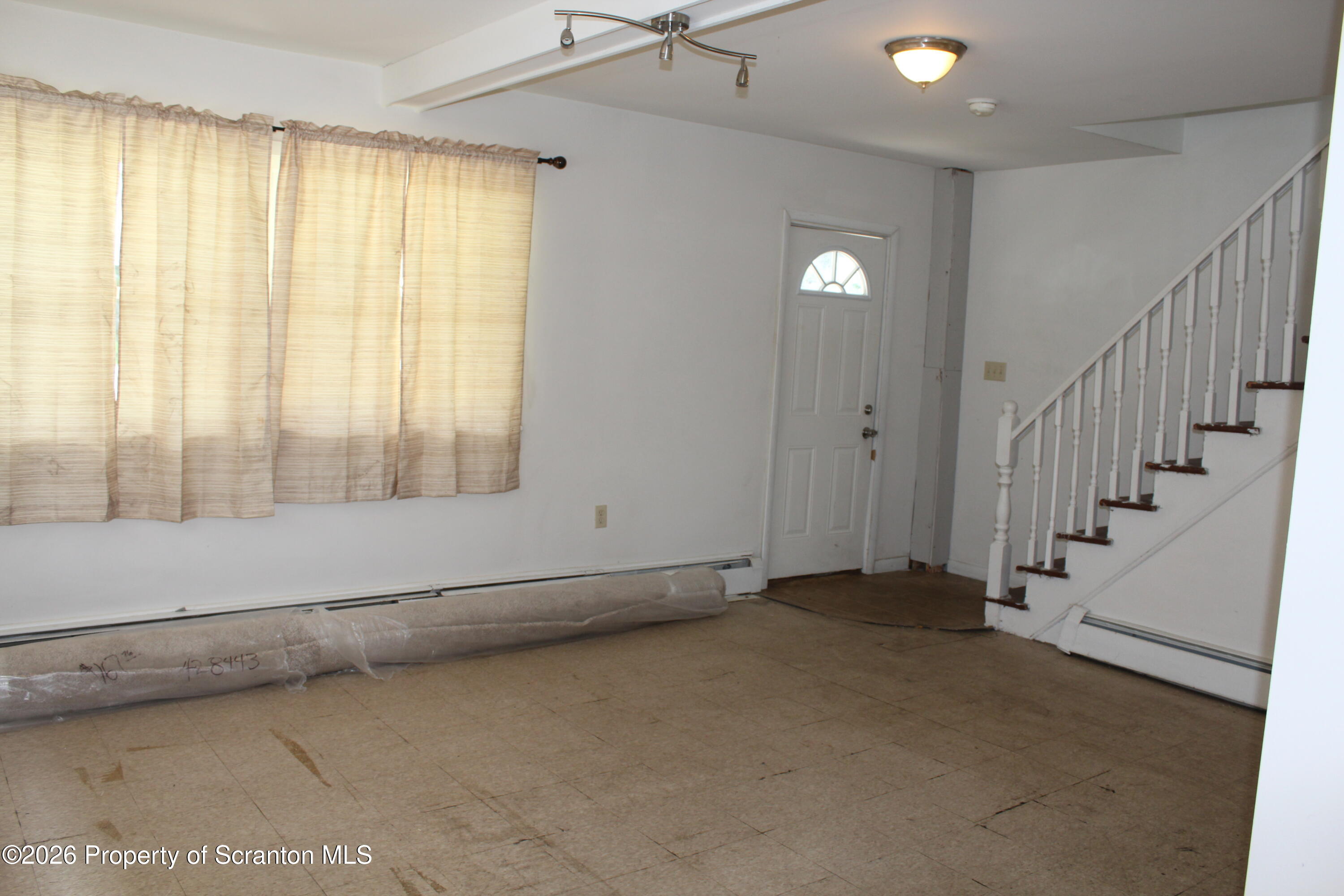 1608 Prospect Avenue Scranton, PA 18505 - Photo 11 of 30 a view of an empty room with a window