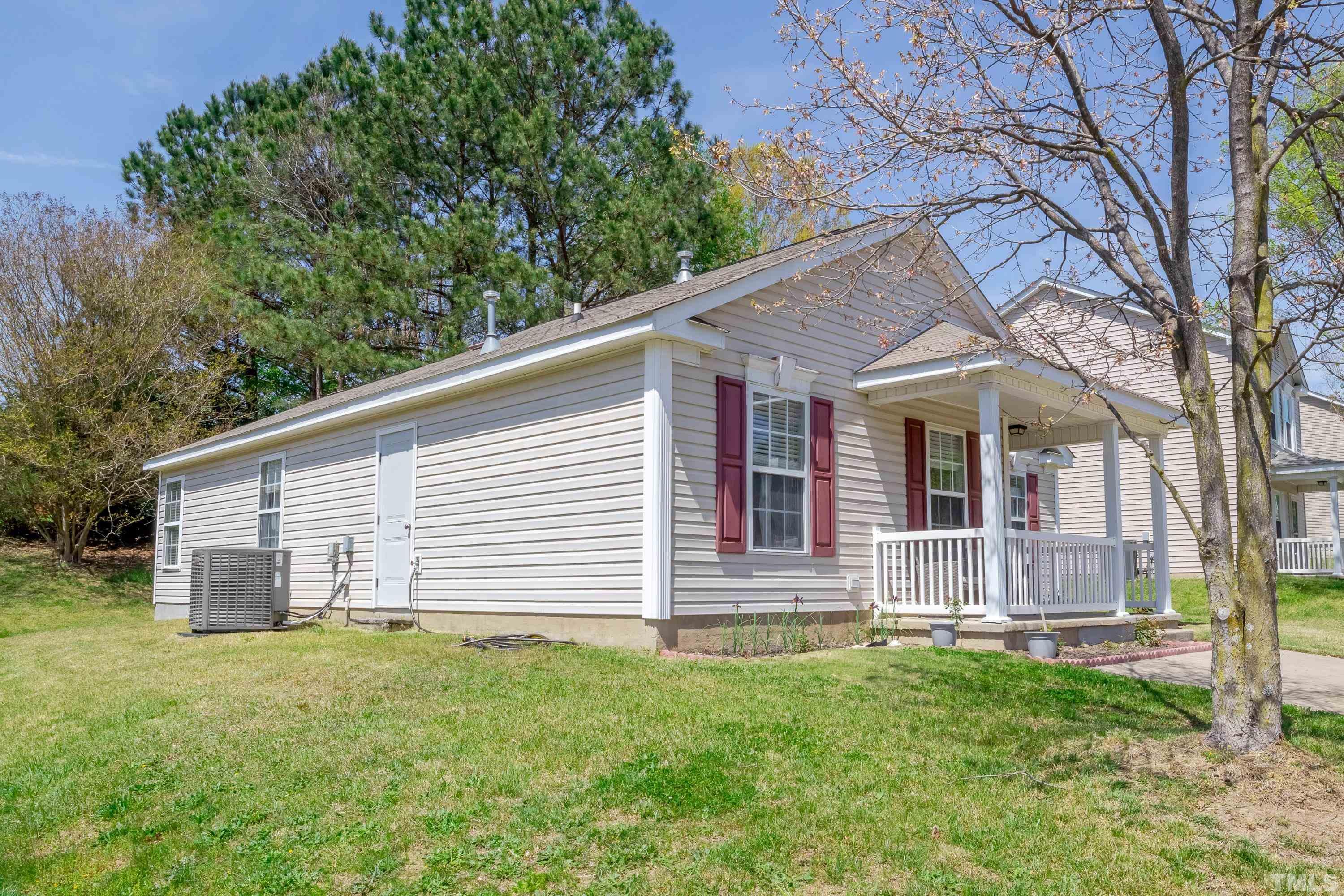 4917 Silverdene Street Raleigh, NC 27616 - Photo 5 of 37 a front view of a house with a yard