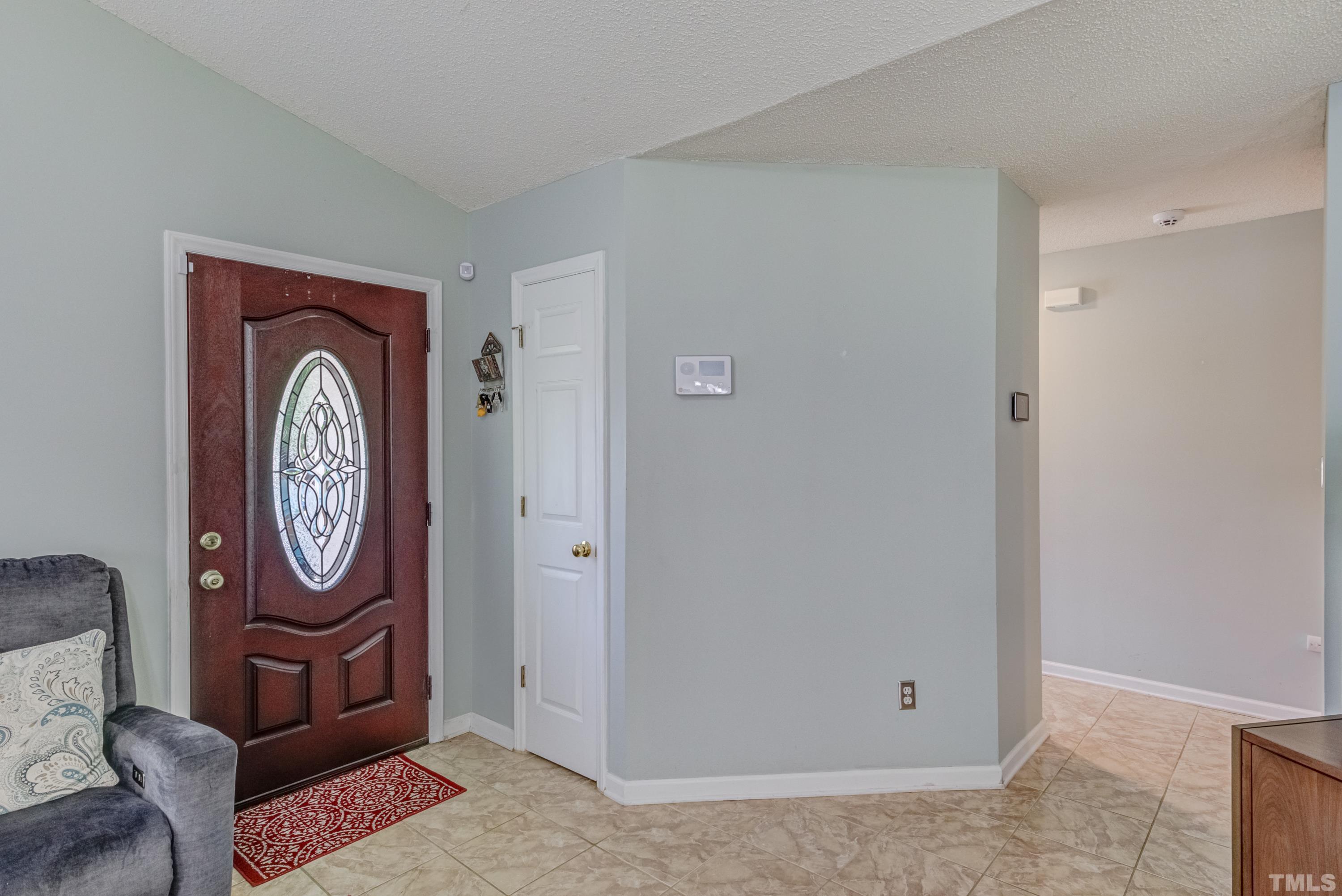 4917 Silverdene Street Raleigh, NC 27616 - Photo 8 of 37 a view of an entryway with a door