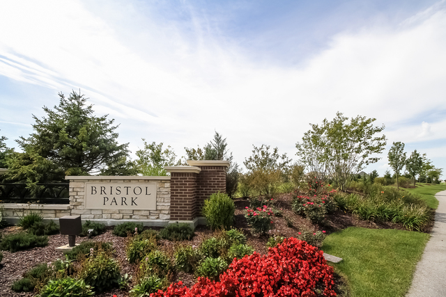 971 Redcliff Road New Lenox, IL 60451 - Photo 29 of 51 a sign that is sitting in front of flowers