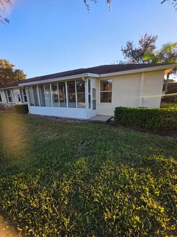 a view of a house with a garden