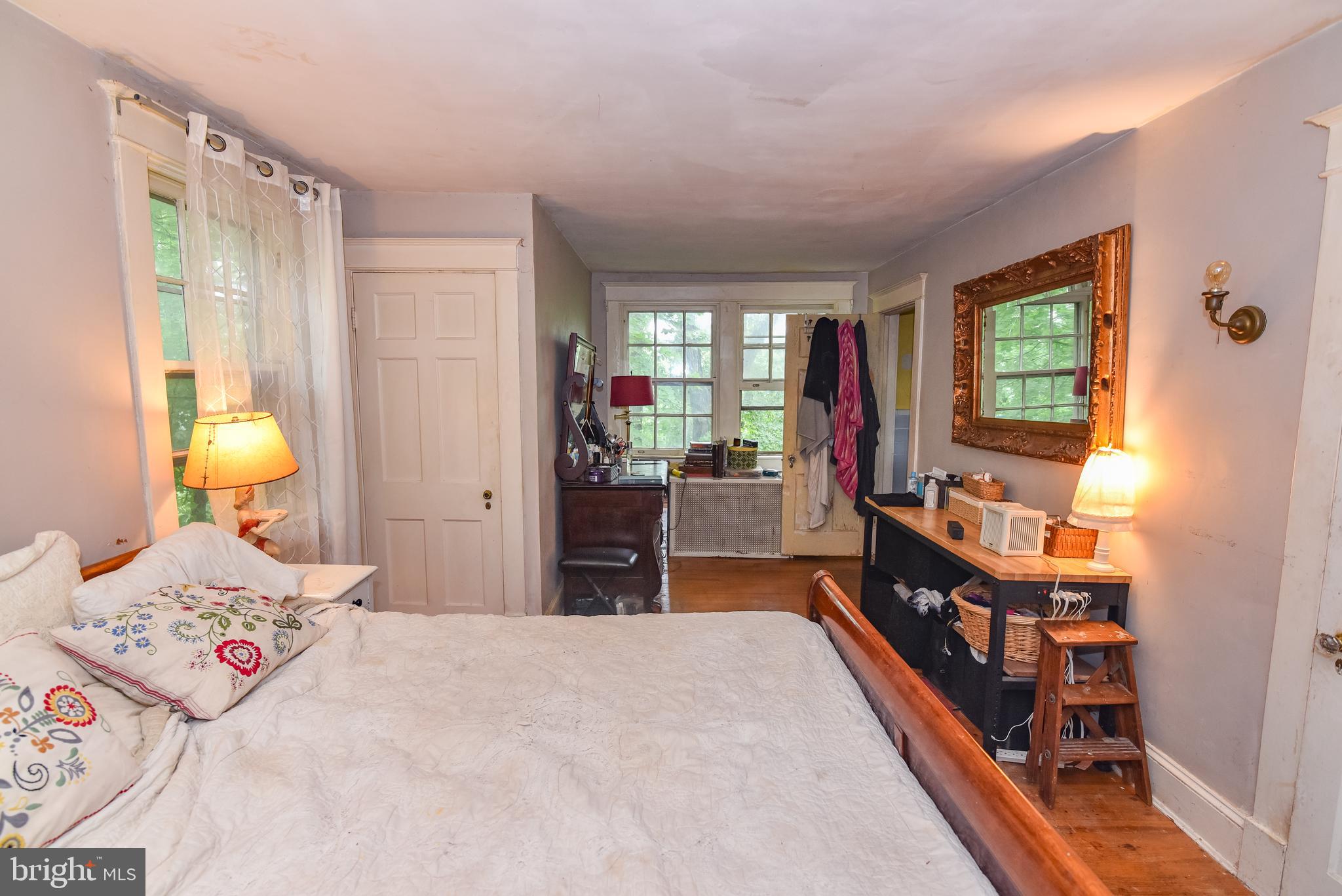 24 Merrymount Road Baltimore, MD 21210 - Photo 28 of 48 a bedroom with furniture and a large window
