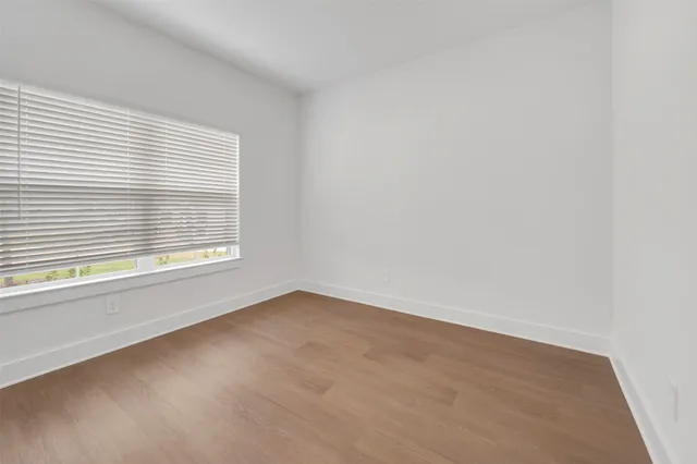 a view of a kitchen with a sink and a stove top oven