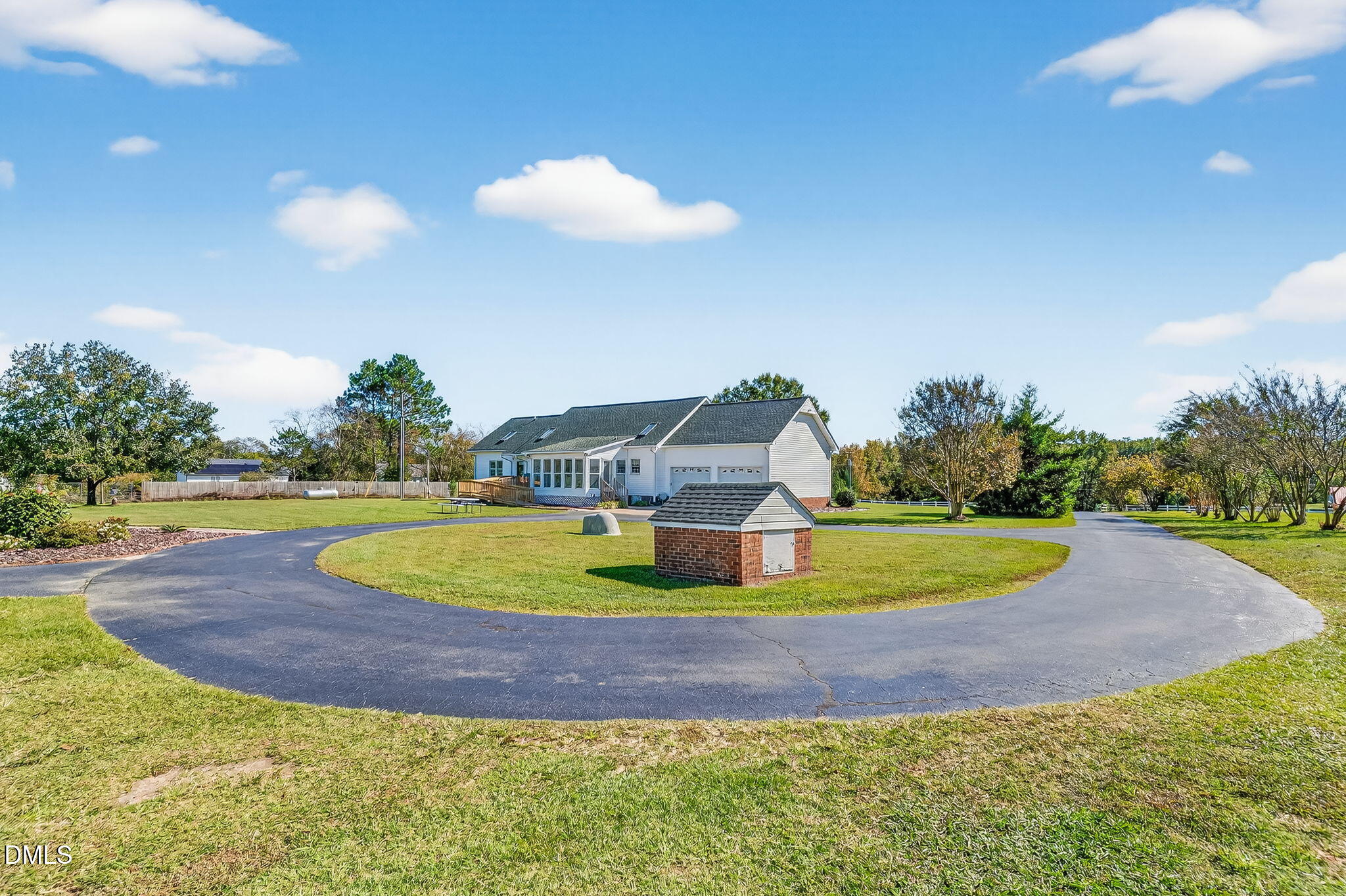 1190 Sanders Road Benson, NC 27504 - Photo 23 of 96 a view of a swimming pool with a yard