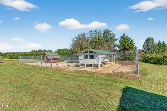 a bedroom with bed and a window