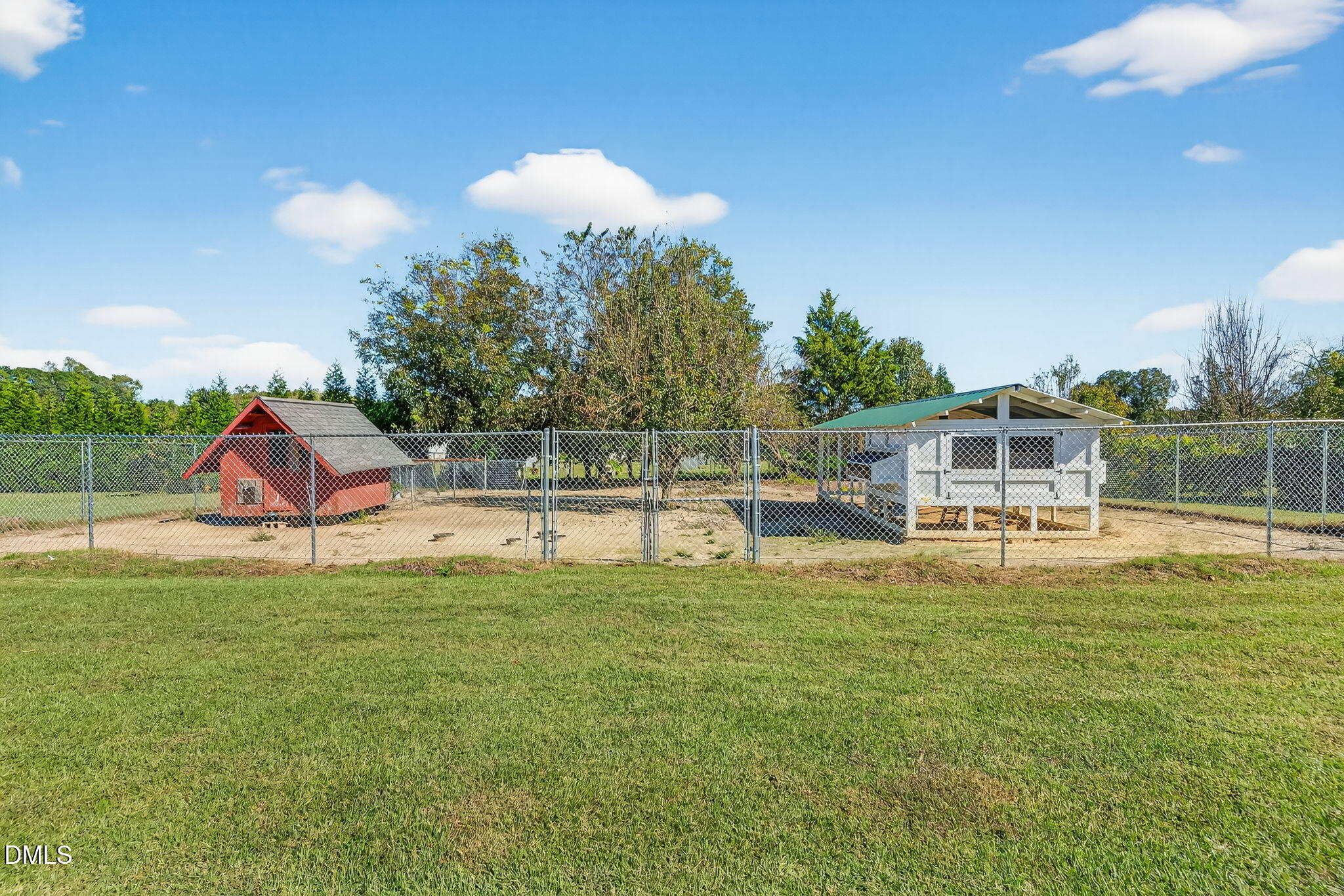 1190 Sanders Road Benson, NC 27504 - Photo 27 of 96 a view of a house with swimming pool
