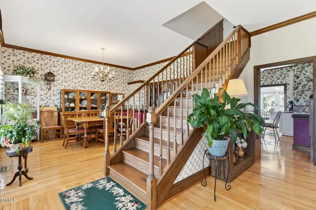 a living room with furniture fireplace and flat screen tv