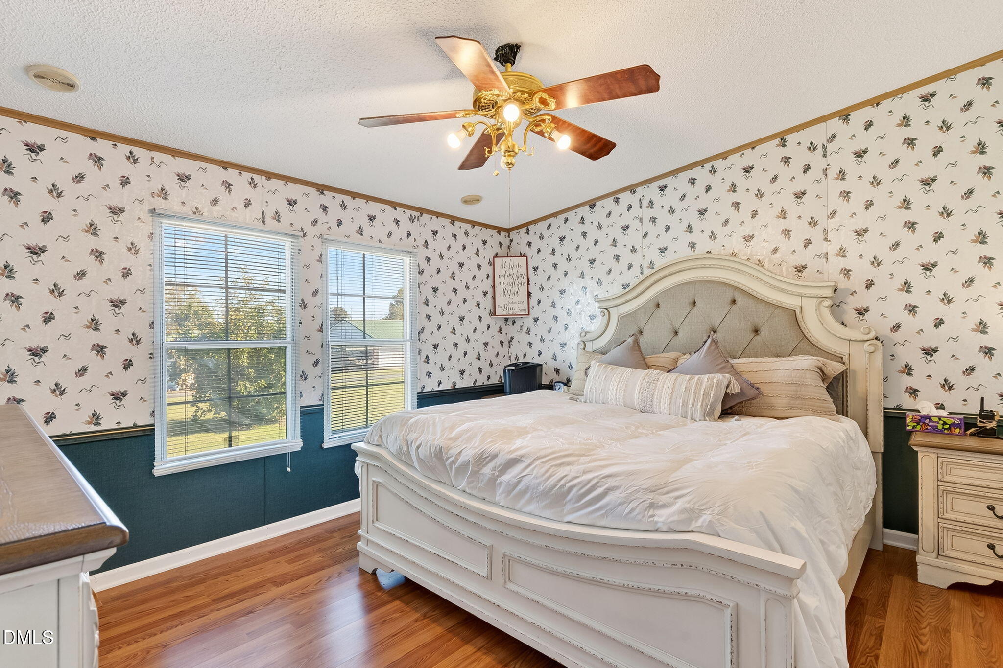 1190 Sanders Road Benson, NC 27504 - Photo 67 of 96 a bedroom with a large bed and a window