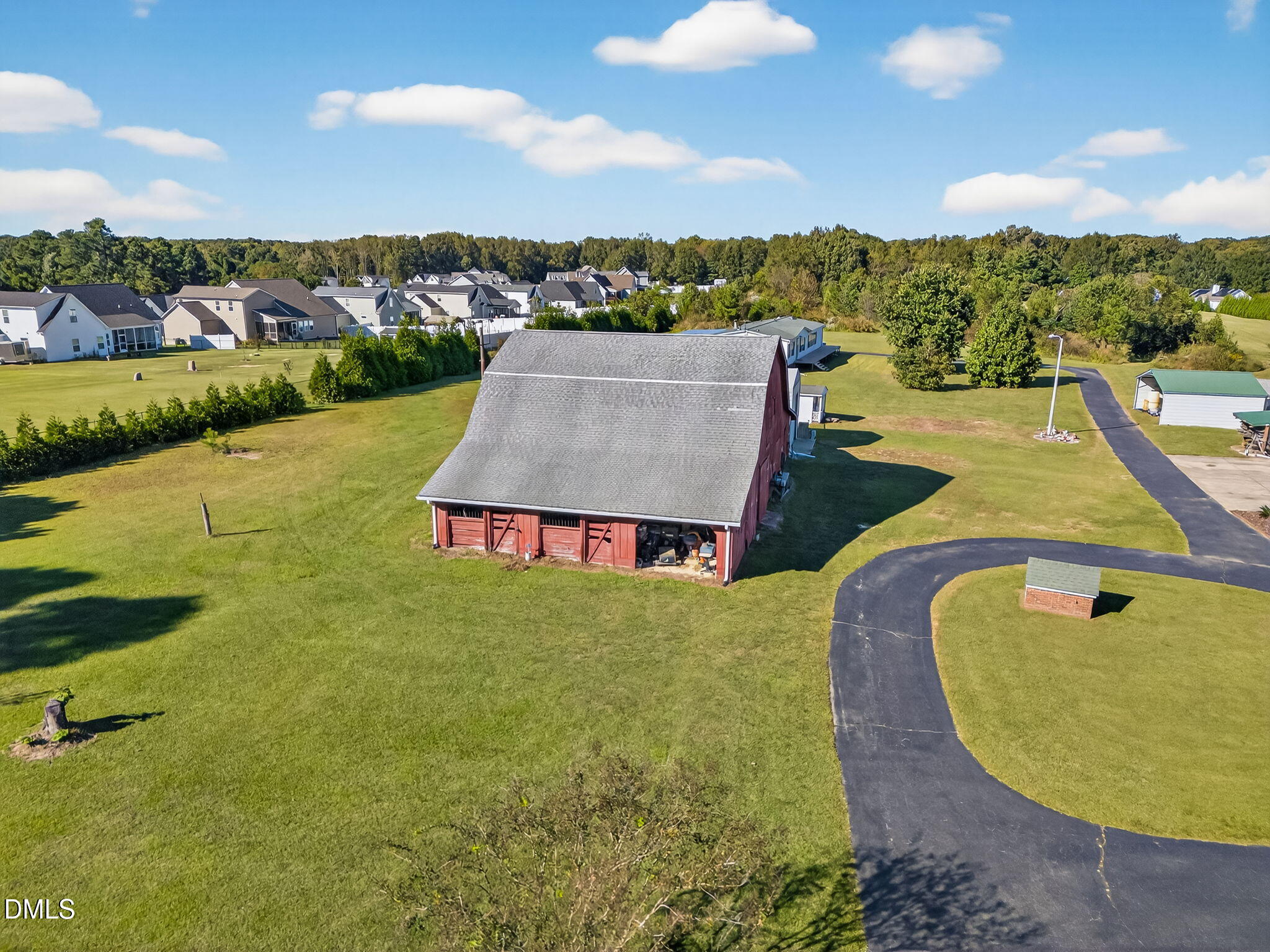 1190 Sanders Road Benson, NC 27504 - Photo 83 of 96 a view of a swimming pool with a terrace