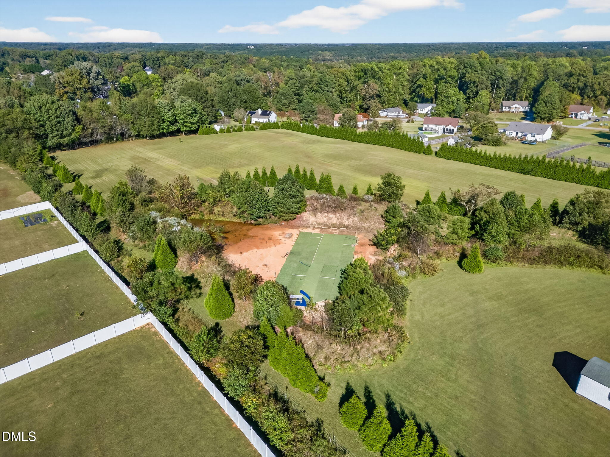 1190 Sanders Road Benson, NC 27504 - Photo 93 of 96 a view of a garden with an outdoor space