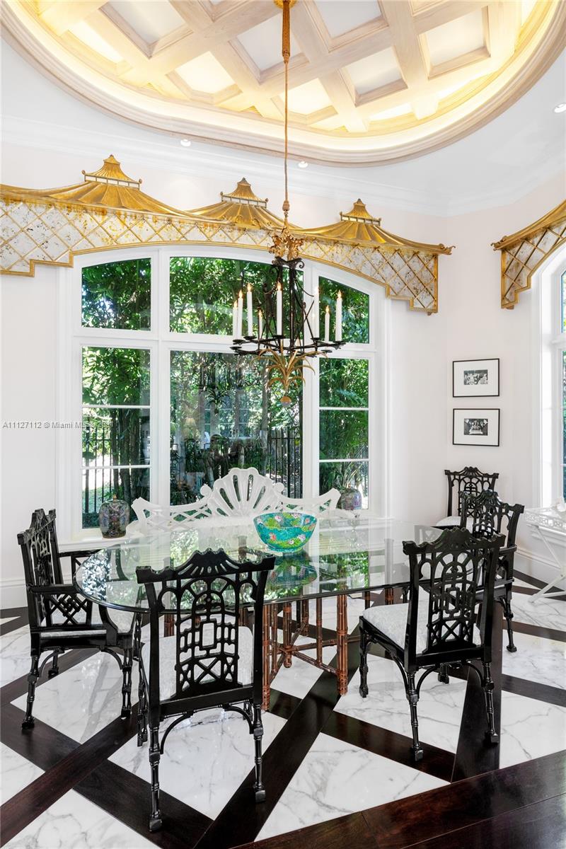 372 Regatta Drive Jupiter, FL 33477 - Photo 35 of 93 a view of a dining room with furniture window and outside view