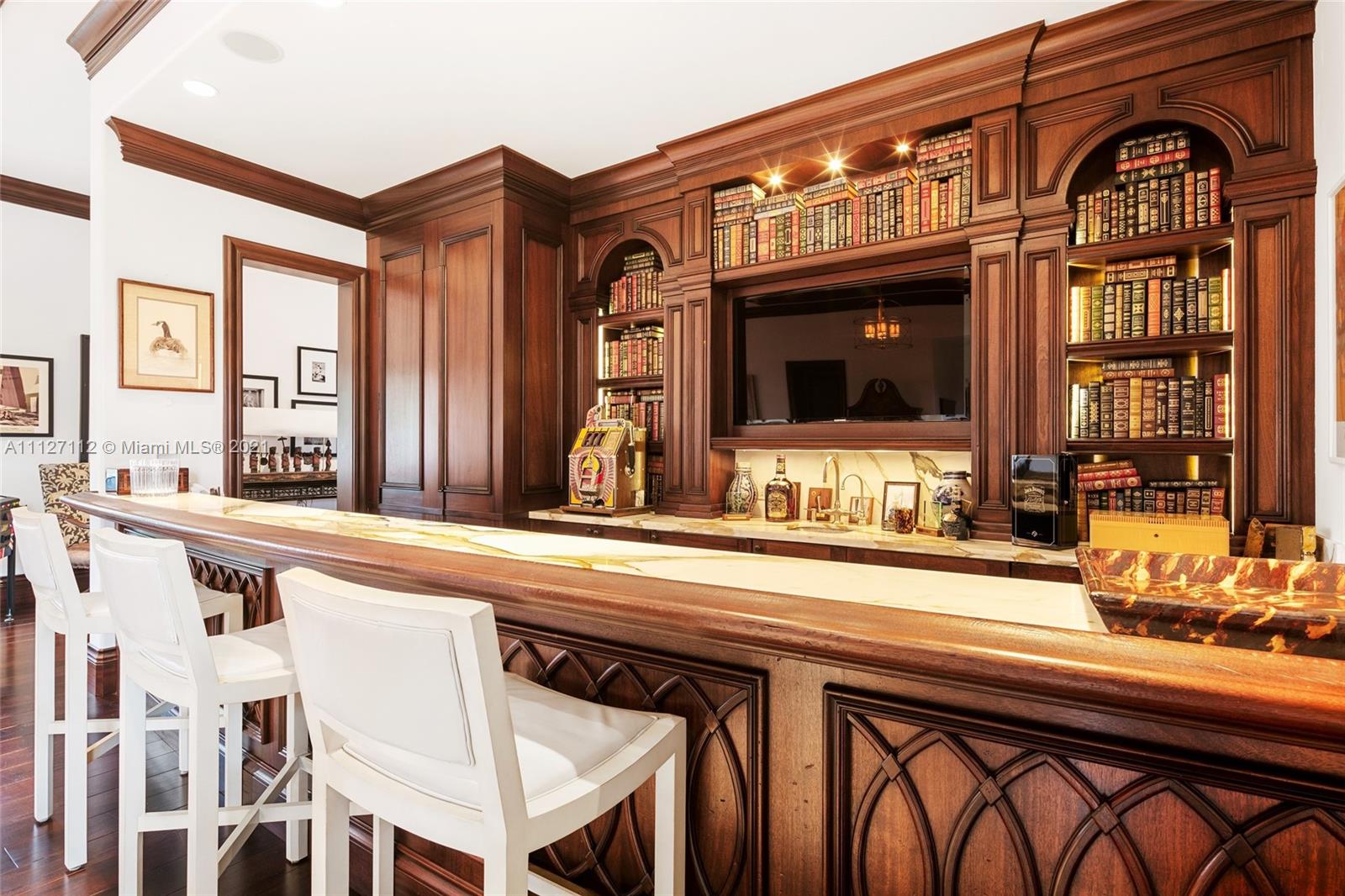 372 Regatta Drive Jupiter, FL 33477 - Photo 63 of 93 a view of a kitchen with a sink and a large mirror