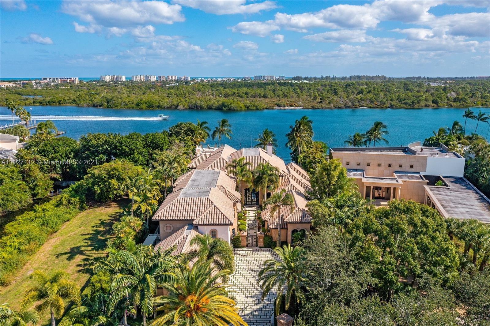 372 Regatta Drive Jupiter, FL 33477 - Photo 8 of 93 an aerial view of a residential houses with outdoor space and ocean view