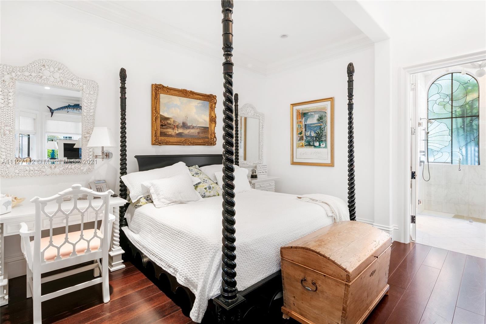 372 Regatta Drive Jupiter, FL 33477 - Photo 74 of 93 a bedroom with a bed and wooden floor