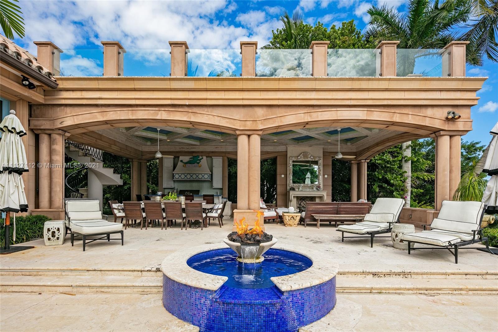 372 Regatta Drive Jupiter, FL 33477 - Photo 79 of 93 a view of a patio with couches chairs and a potted plant