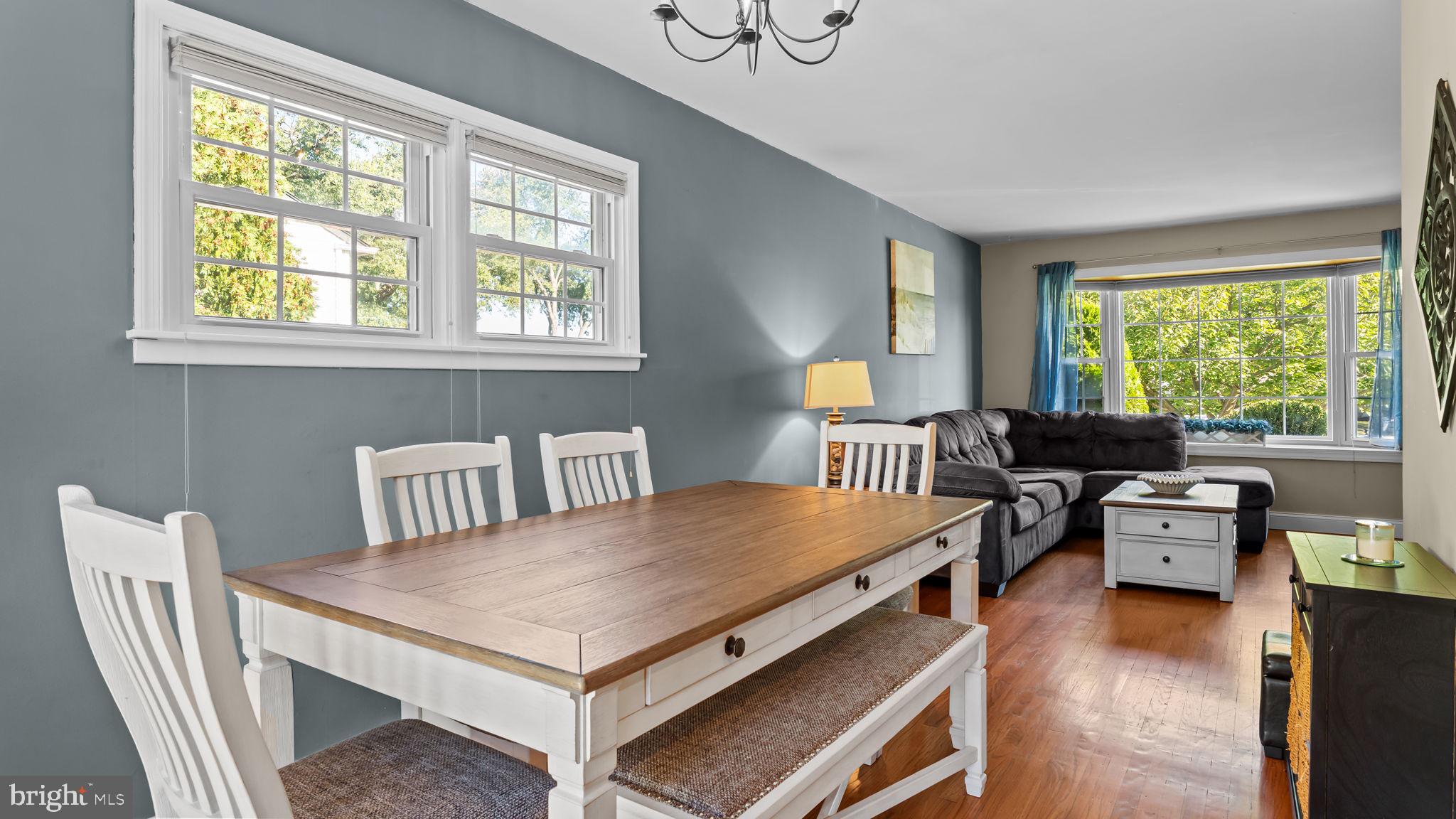 1002 Windsor Road Warminster, PA 18974 - Photo 11 of 57 a living room with furniture a pot on table and a table
