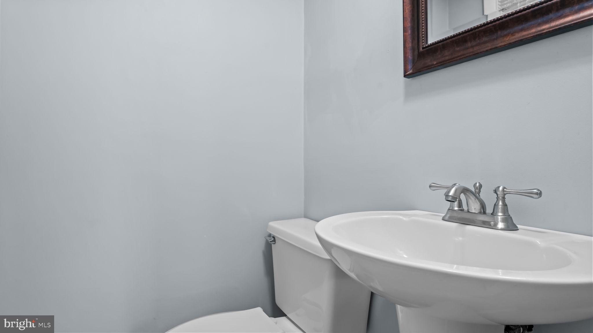 1002 Windsor Road Warminster, PA 18974 - Photo 26 of 57 a bathroom with a sink and toilet