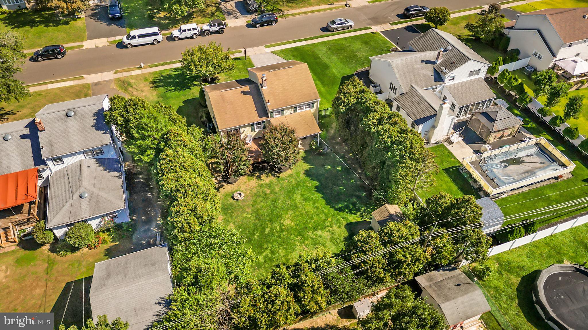 1002 Windsor Road Warminster, PA 18974 - Photo 50 of 57 an aerial view of a house with a yard basket ball court and outdoor seating