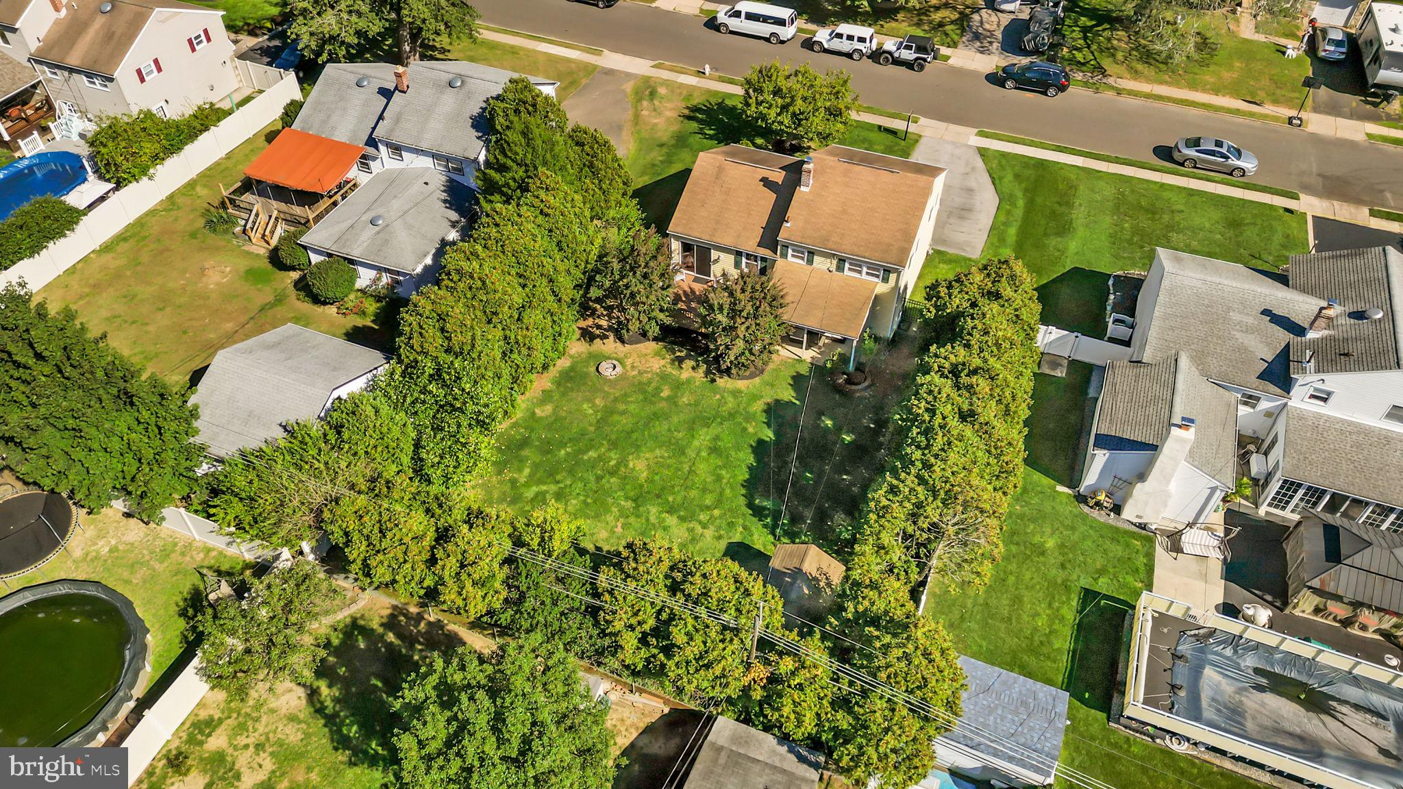 1002 Windsor Road Warminster, PA 18974 - Photo 51 of 57 an aerial view of a house with a yard and lake view