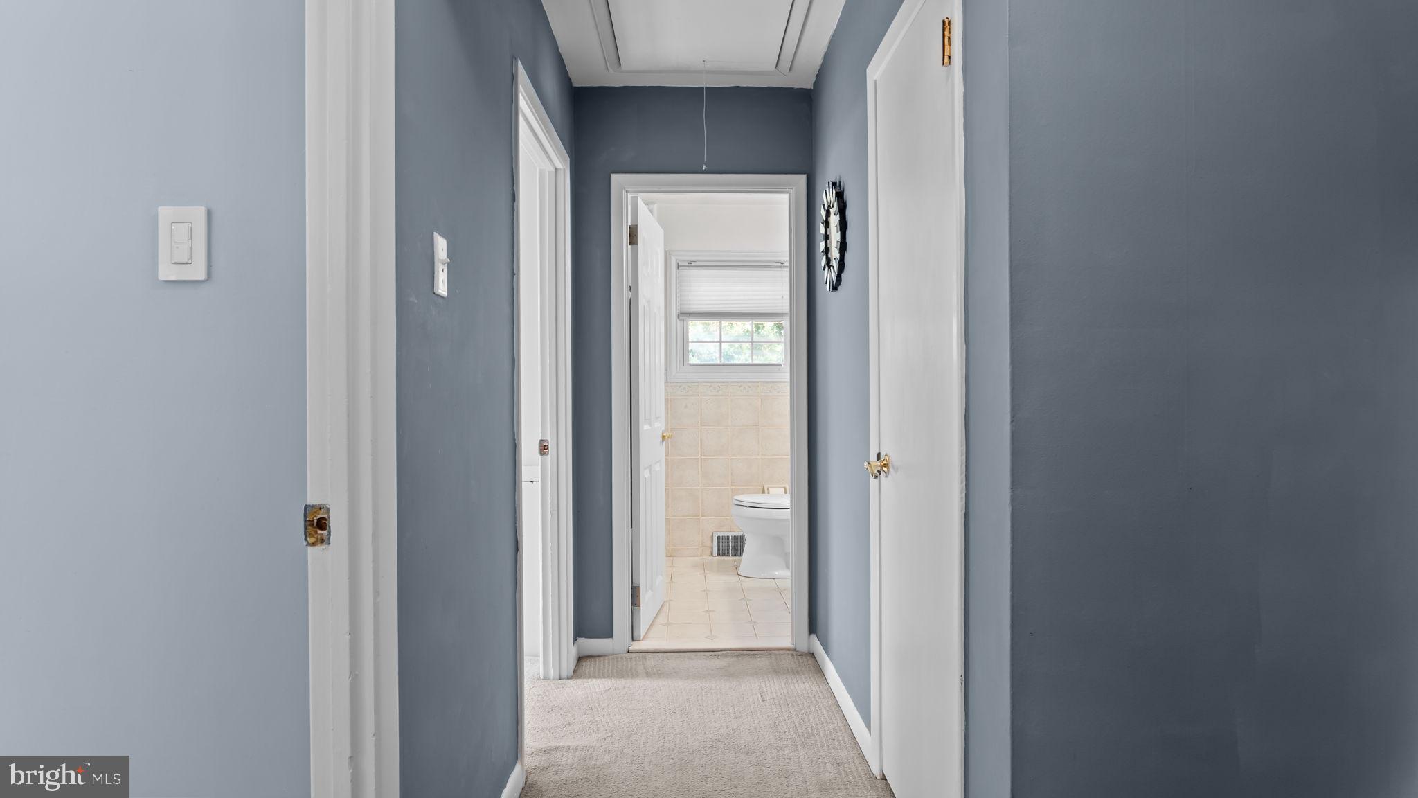 1002 Windsor Road Warminster, PA 18974 - Photo 6 of 57 a view of a hallway with wooden floor