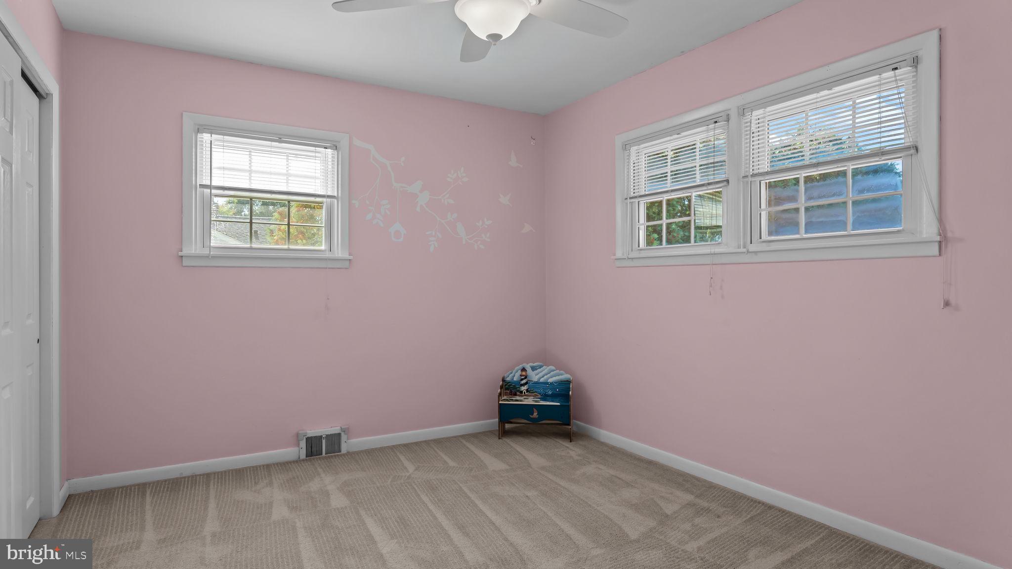 1002 Windsor Road Warminster, PA 18974 - Photo 7 of 57 an empty room with windows