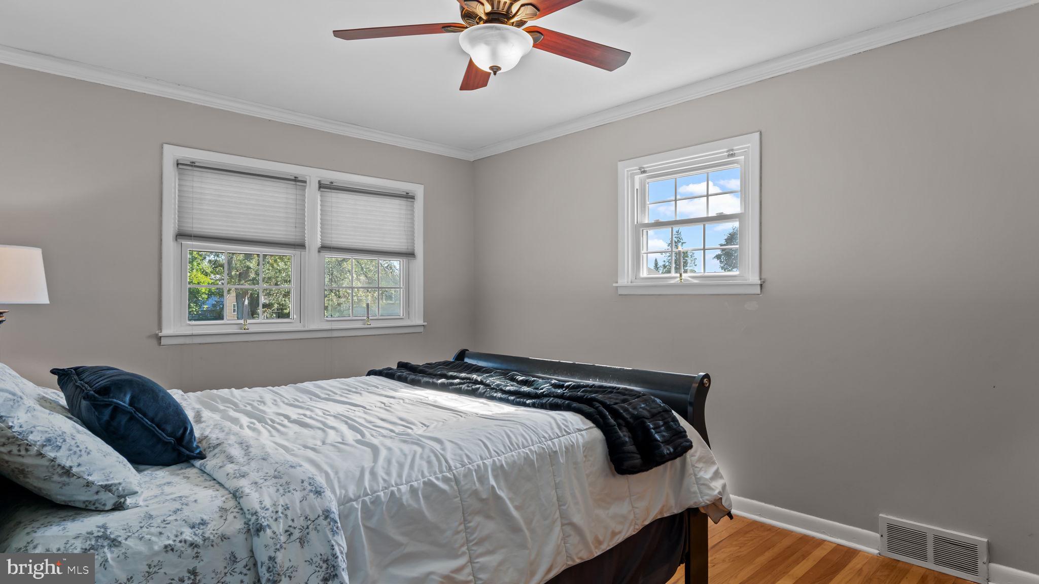 1002 Windsor Road Warminster, PA 18974 - Photo 8 of 57 a bedroom with a bed and window