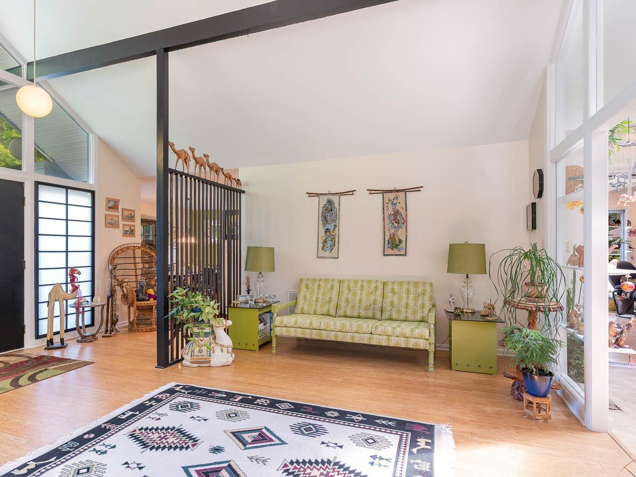 2104 Jarman Drive Raleigh, NC 27604 - Photo 12 of 37 a bedroom with furniture and a wooden floor