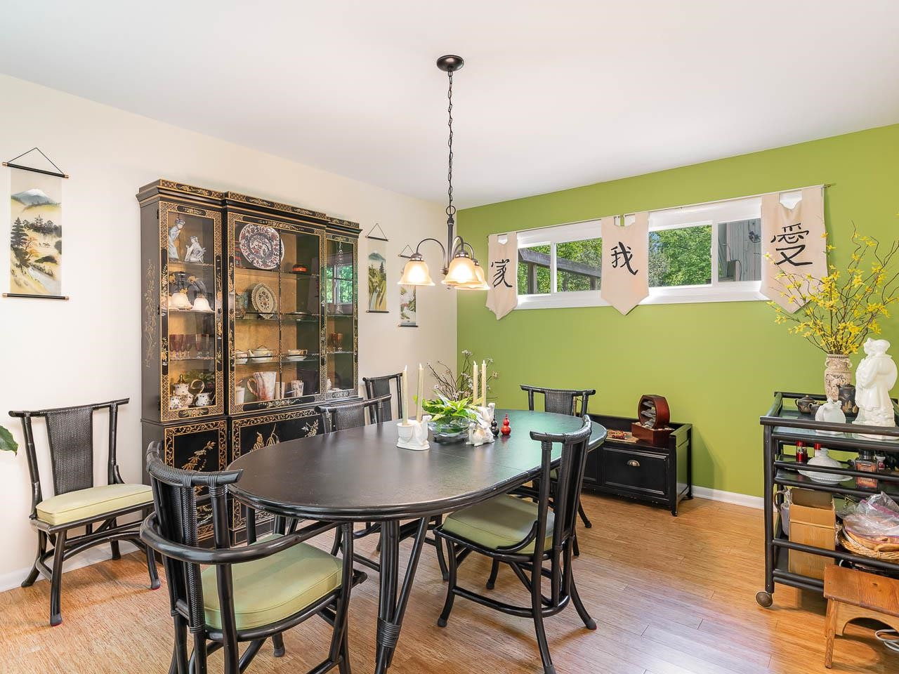 2104 Jarman Drive Raleigh, NC 27604 - Photo 13 of 37 a view of a dining room with furniture window and outside view