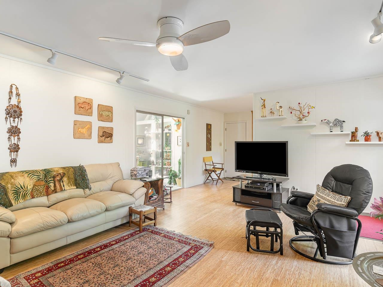 2104 Jarman Drive Raleigh, NC 27604 - Photo 15 of 37 a living room with furniture and a flat screen tv