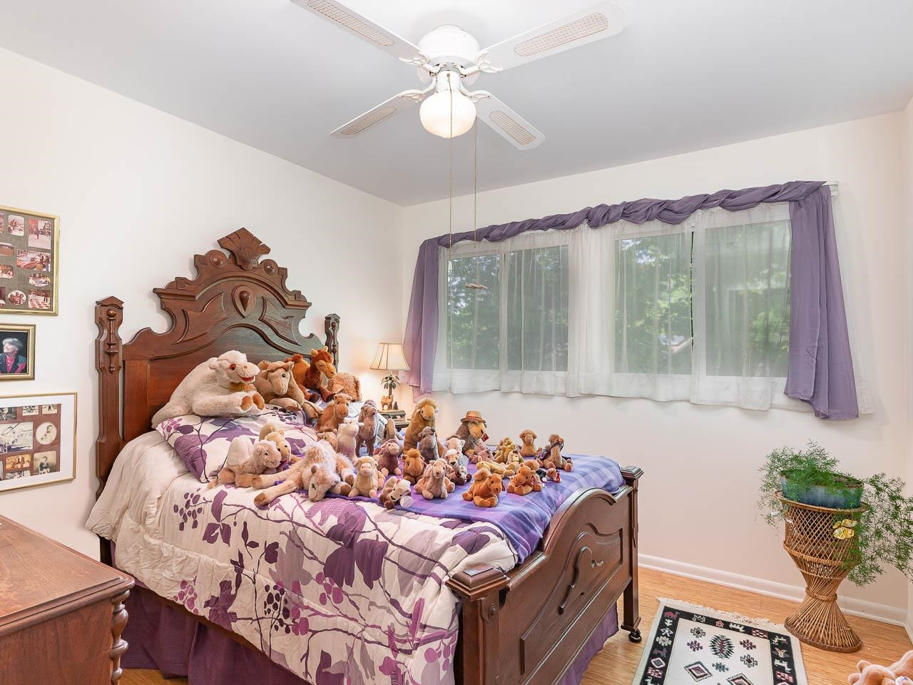 2104 Jarman Drive Raleigh, NC 27604 - Photo 21 of 37 a bed sitting in a bedroom next to a window
