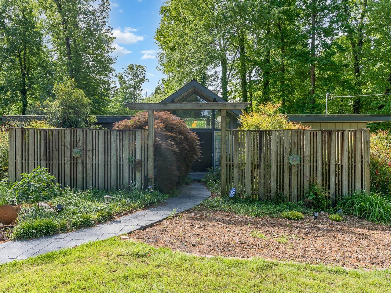 2104 Jarman Drive Raleigh, NC 27604 - Photo 3 of 37 a view of a backyard with green space