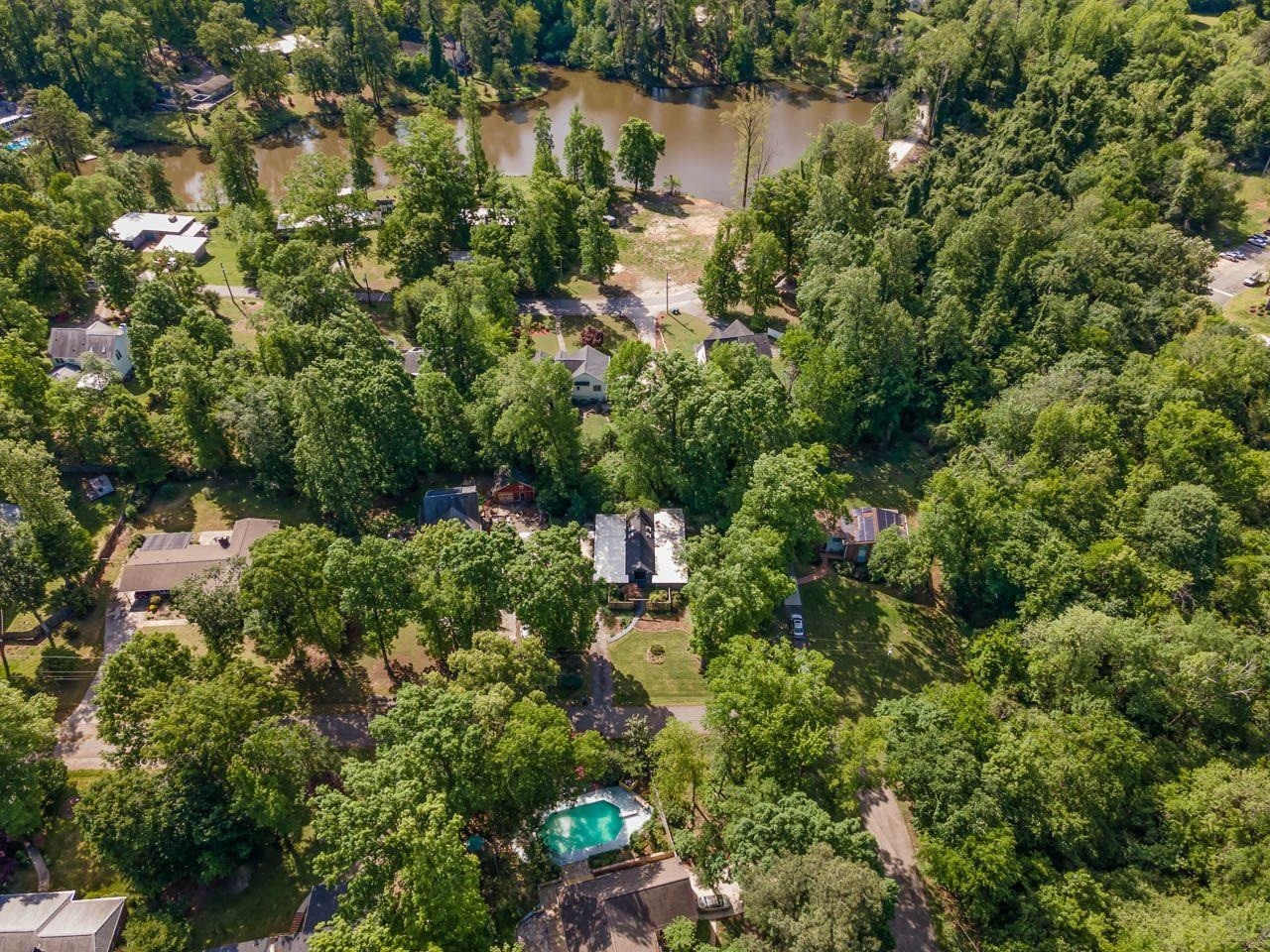 2104 Jarman Drive Raleigh, NC 27604 - Photo 32 of 37 a backyard of a house with a yard and outdoor seating