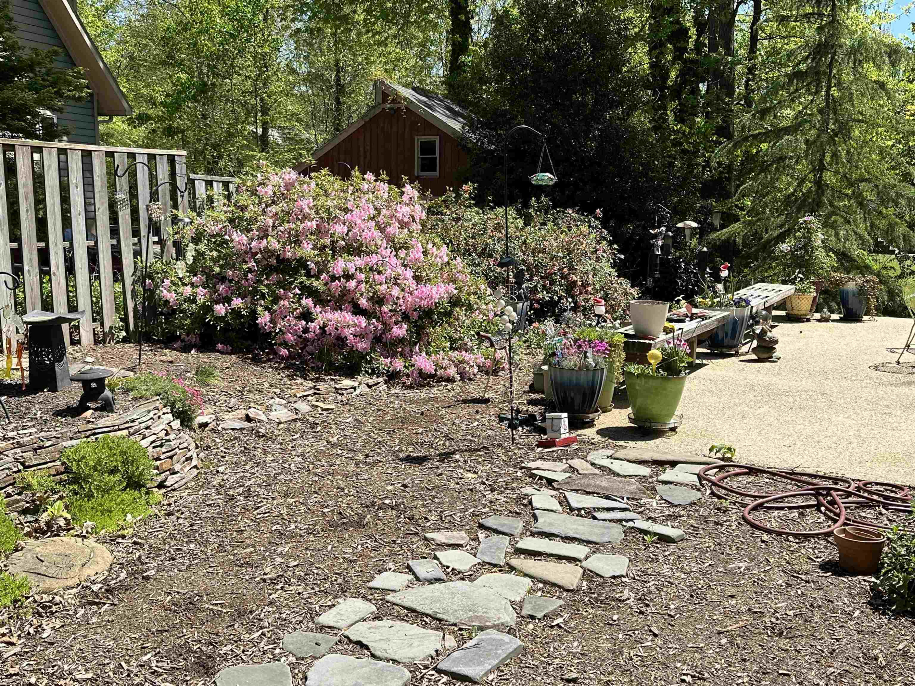 2104 Jarman Drive Raleigh, NC 27604 - Photo 36 of 37 a view of a pathway with a flower garden