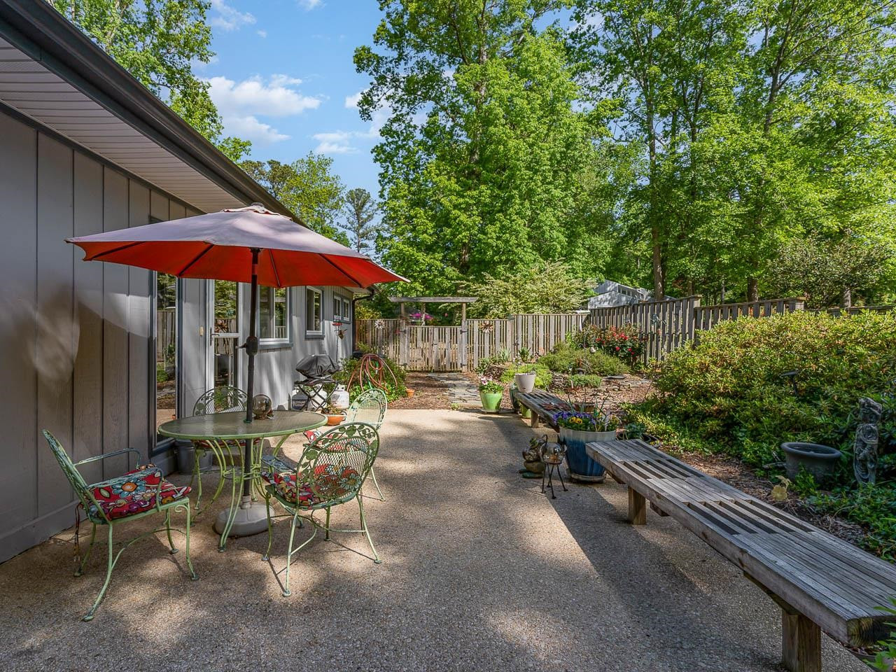 2104 Jarman Drive Raleigh, NC 27604 - Photo 10 of 37 a view of backyard with outdoor seating and trees