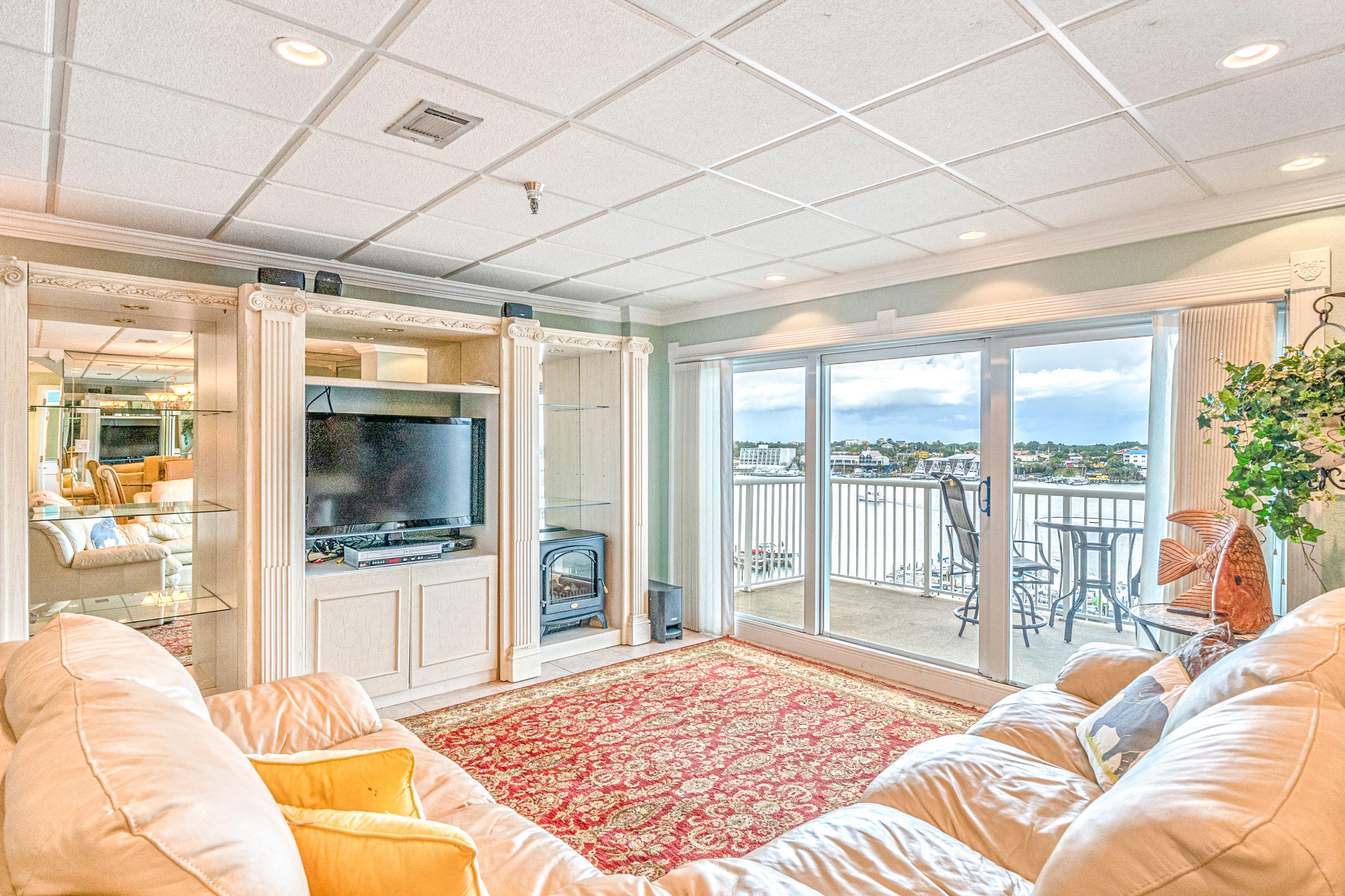 197 Durango Road, Unit 6A Destin, FL 32541 - Photo 2 of 43 a bedroom with furniture and large windows