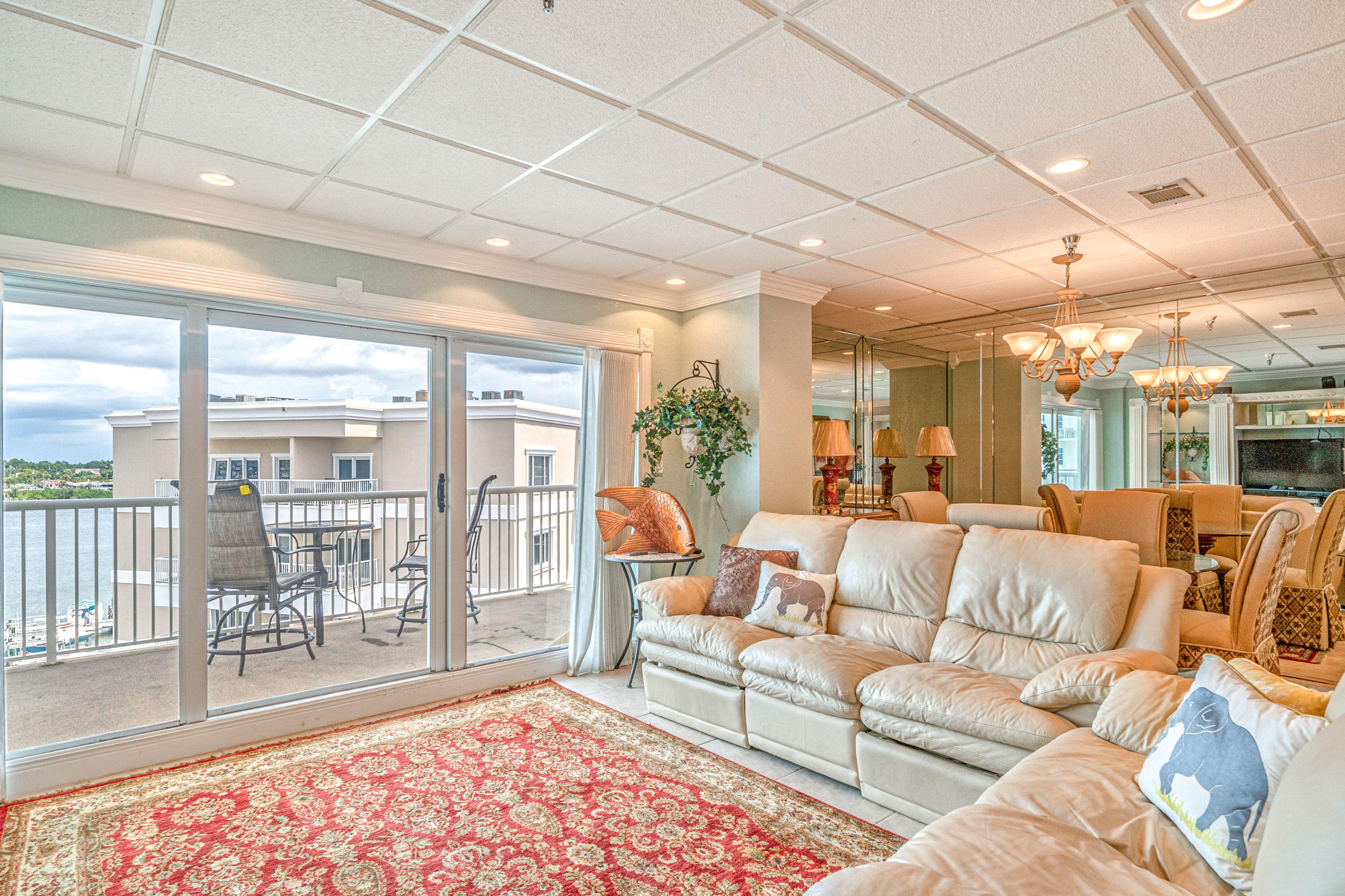 197 Durango Road, Unit 6A Destin, FL 32541 - Photo 13 of 43 a living room with furniture and a large window