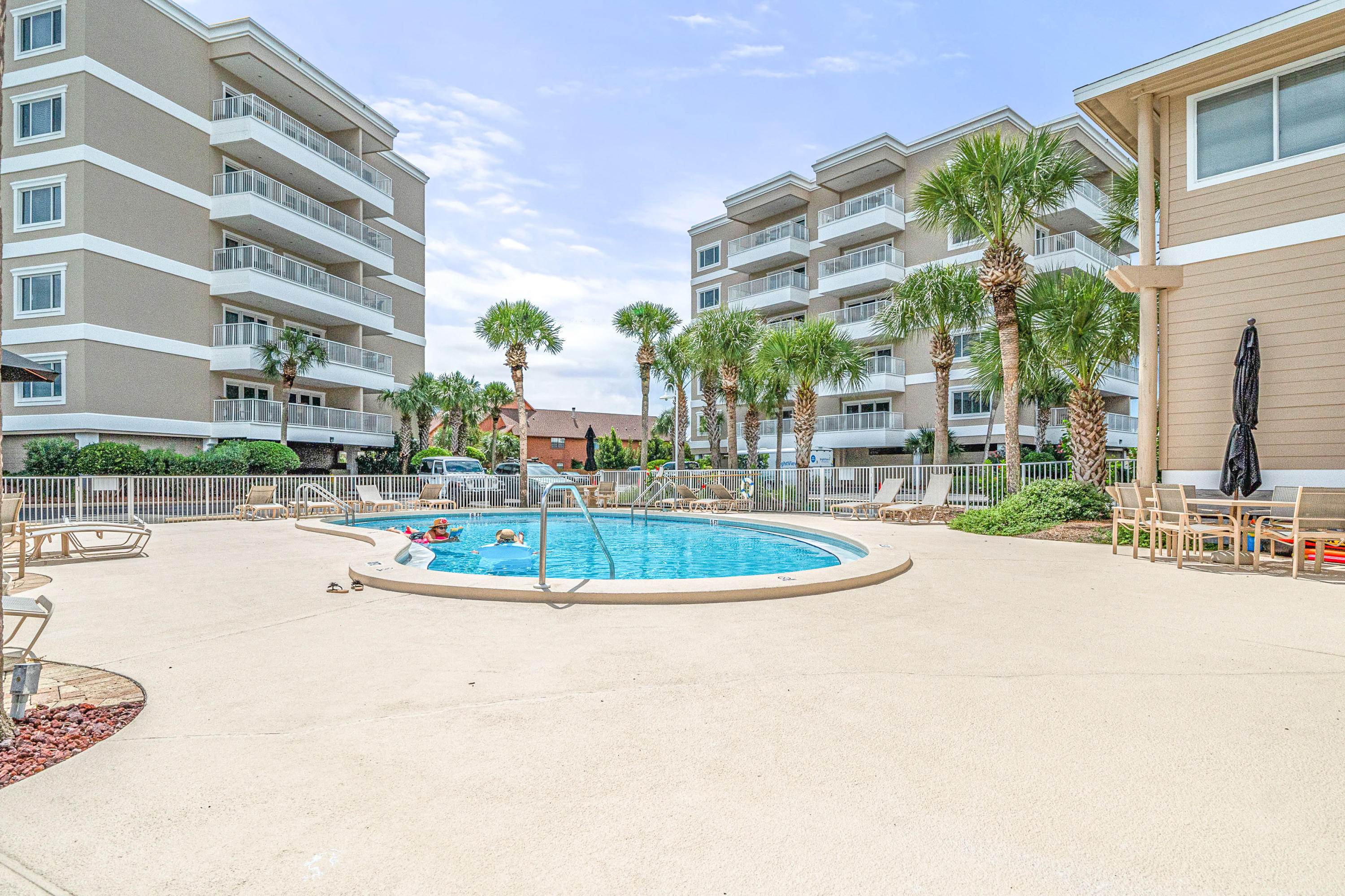 197 Durango Road, Unit 6A Destin, FL 32541 - Photo 29 of 43 a view of a building with a swimming pool
