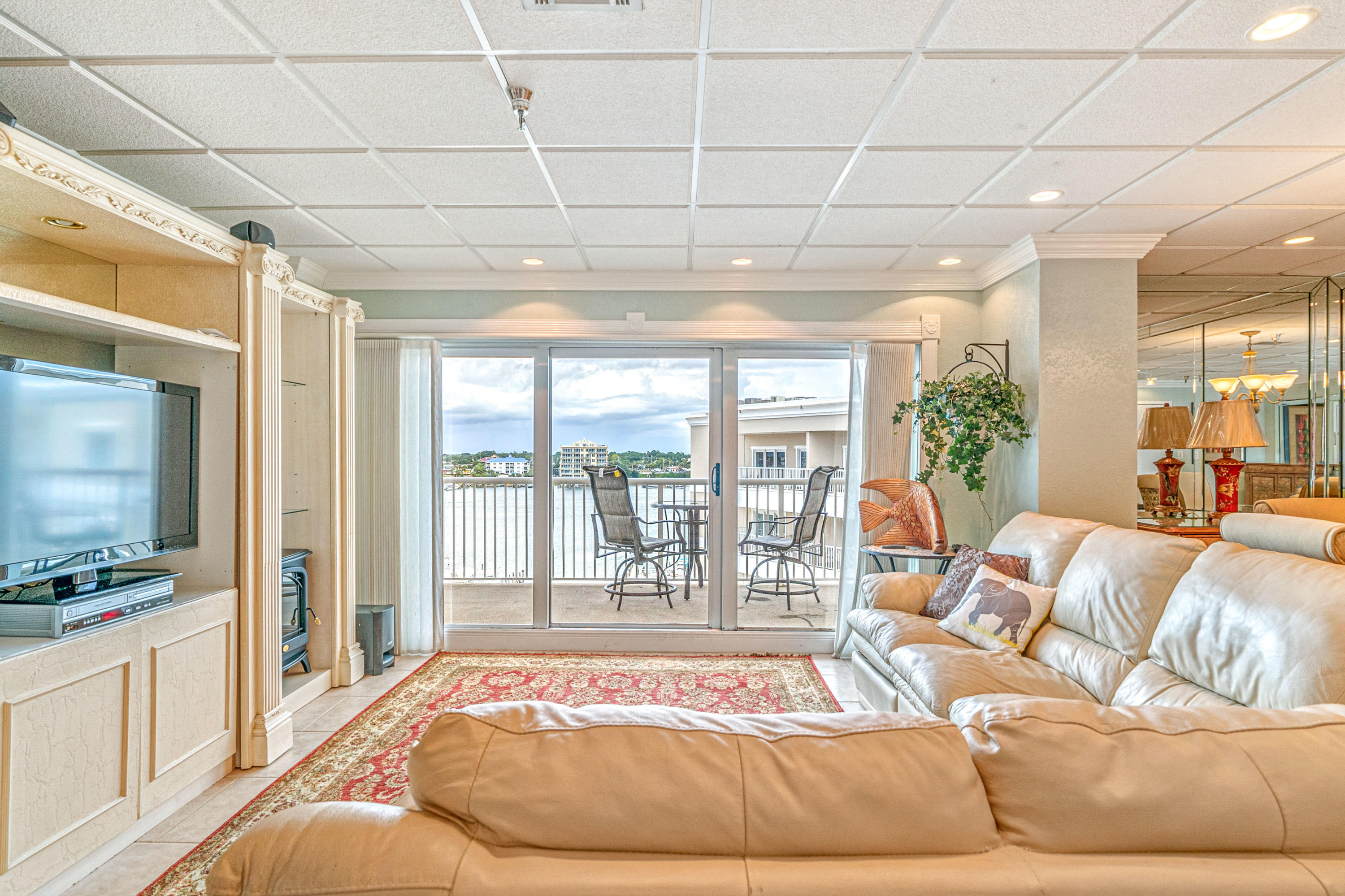 197 Durango Road, Unit 6A Destin, FL 32541 - Photo 8 of 43 a living room with furniture and a flat screen tv