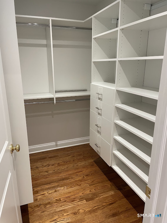 9 Tory Hole Road Darien, CT 06820 - Photo 17 of 33 a view of an empty walk in closet