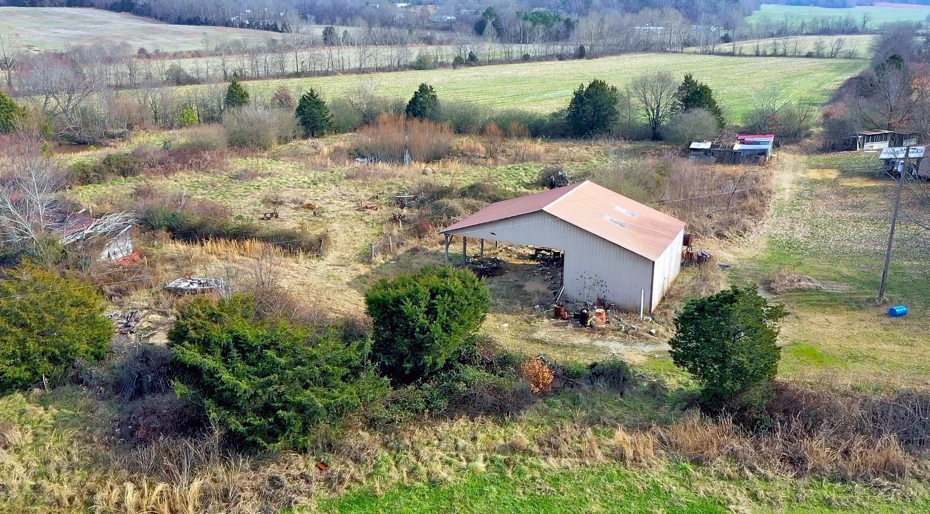 4020 Huron Road Huron, TN 38345 - Photo 18 of 24 an aerial view of a house with pool and a yard