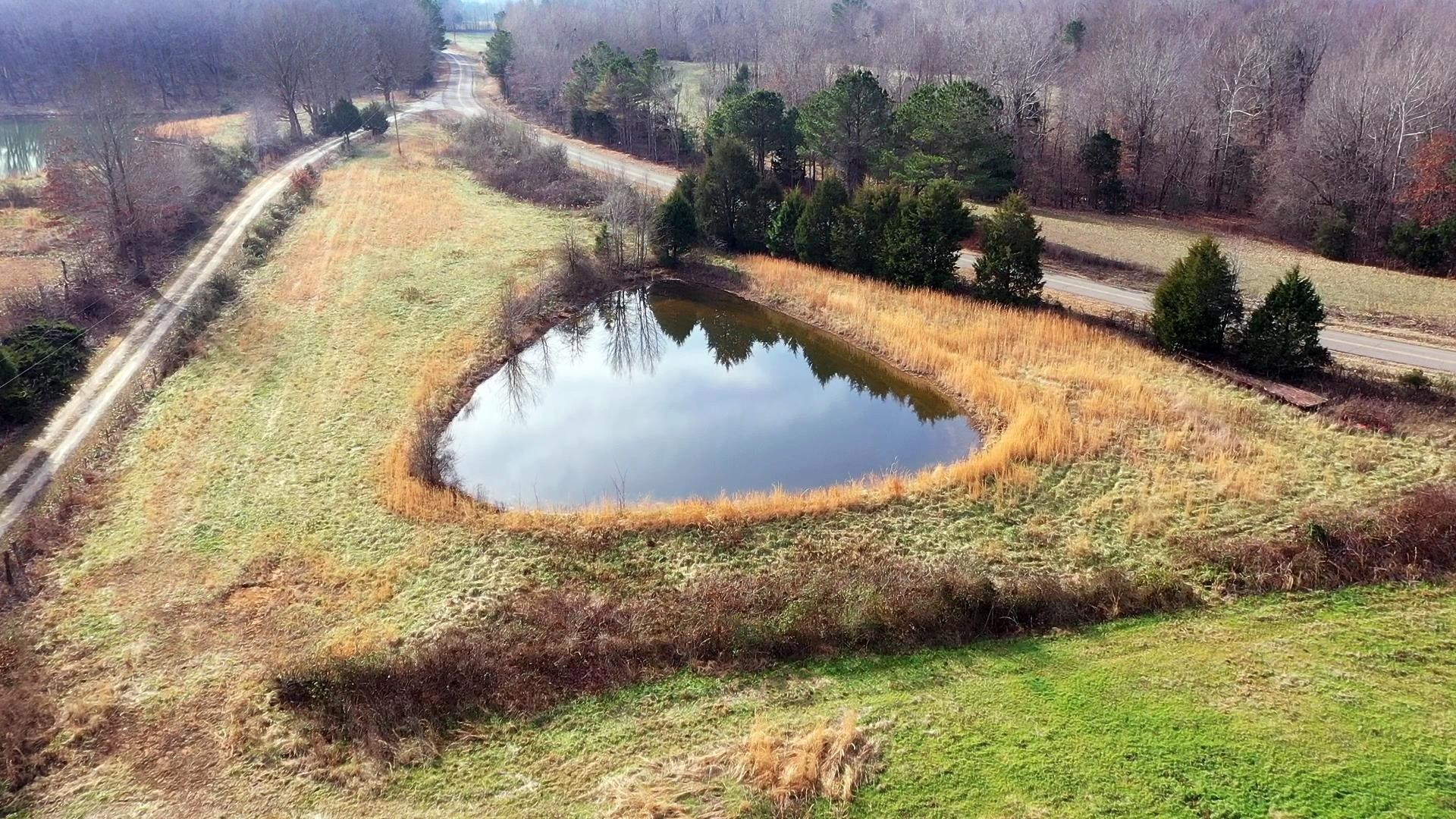 4020 Huron Road Huron, TN 38345 - Photo 20 of 24 a view of a swimming pool with a yard