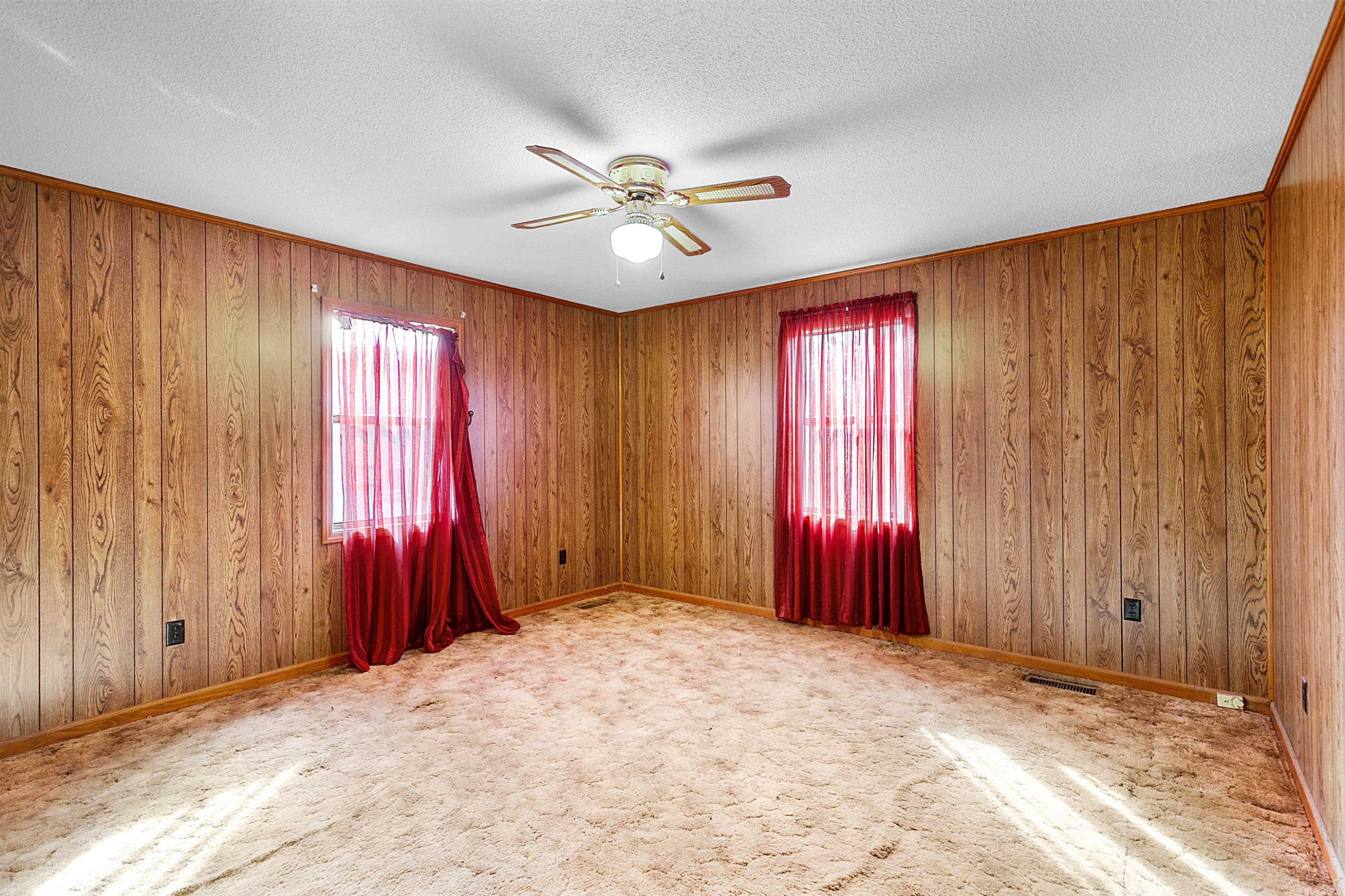 4020 Huron Road Huron, TN 38345 - Photo 8 of 24 an empty room with windows and closet area