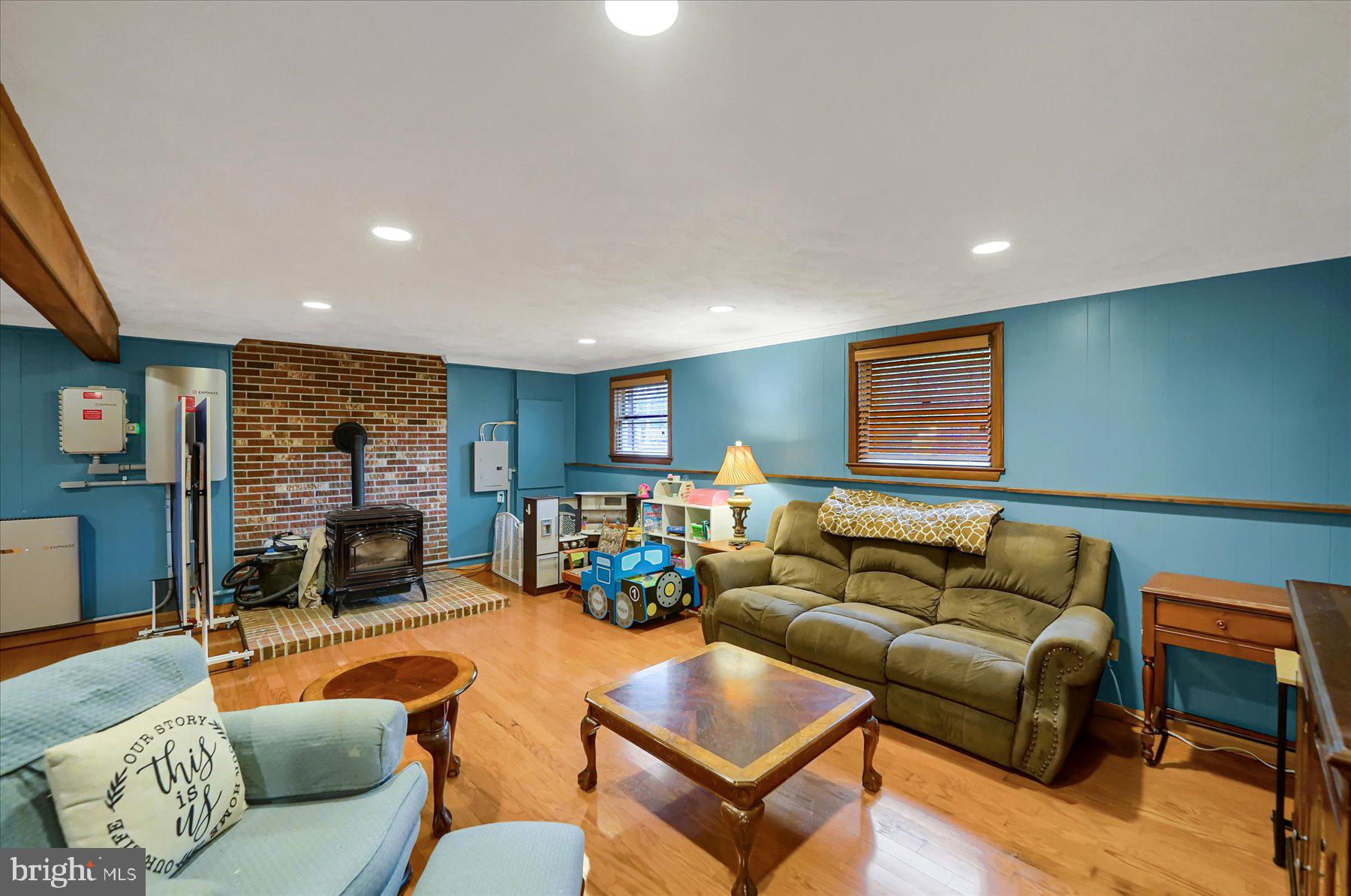768 Dry Hollow Road Warriors Mark, PA 16877 - Photo 25 of 56 a living room with furniture and a flat screen tv